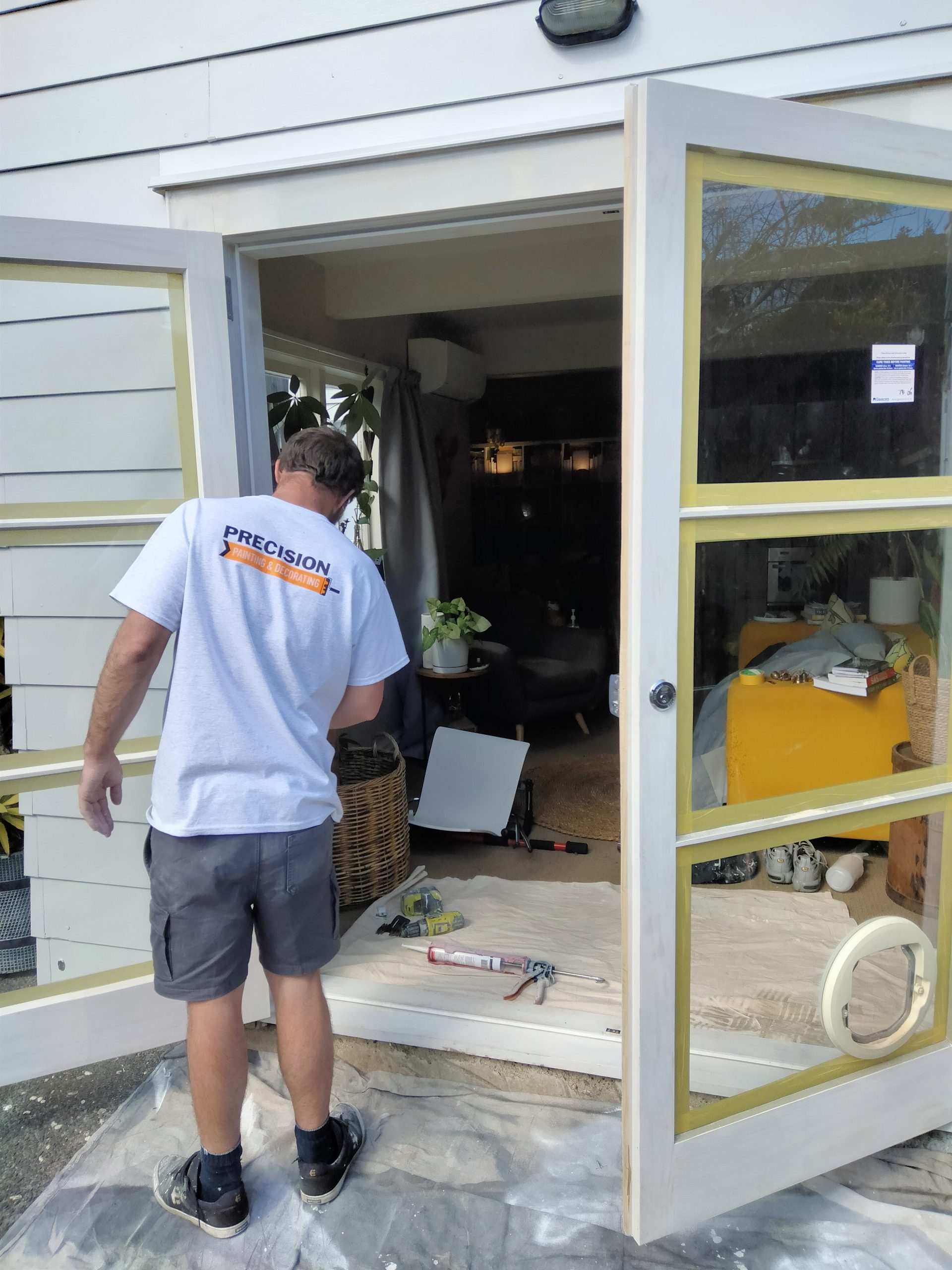 Precision Painter painting doors